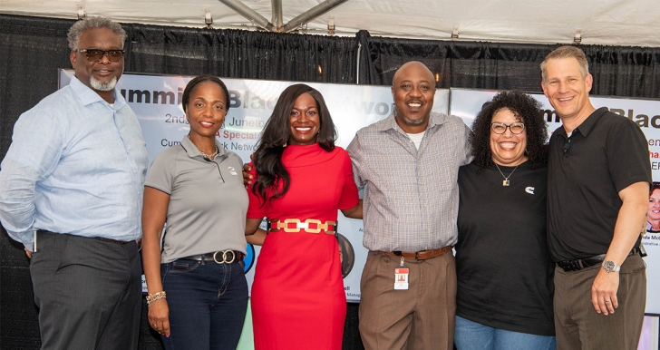 Employees smiling at Juneteenth Jamboree